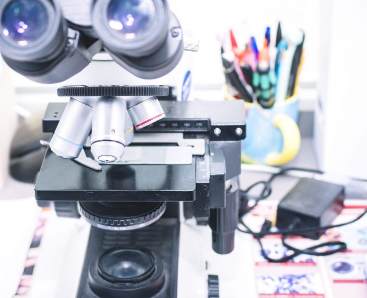 Close-up of a microscope with different optics.
